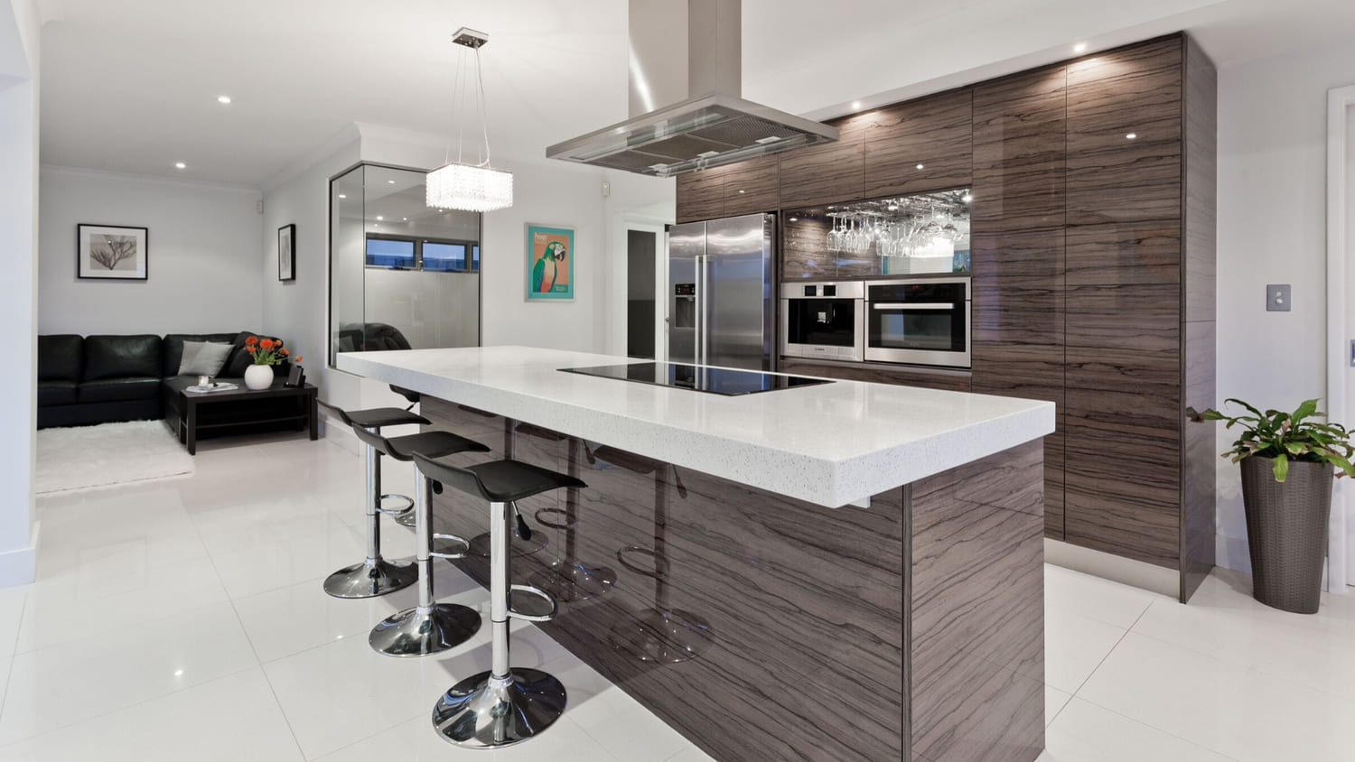 A shiny kitchen with nice white tile floors
